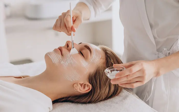 How do chemical peels target uneven skin tone?