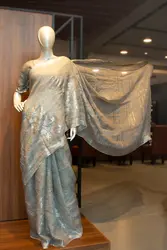 Grey linen saree with silver border 